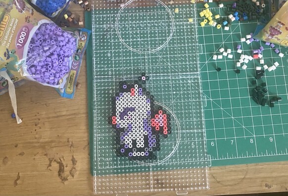 Image of a Moogle made from perler beads from Final Fantasy 6 