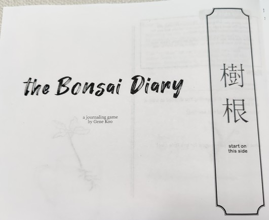 The front cover of The Bonsai Diary. Name is in a brush font with some (kanji?) Along the left edge. Author is Gene Koo