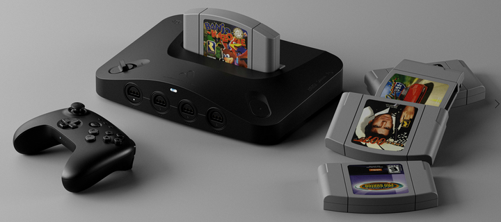 A promotional photo of a black Analogue 3D console with an 8bitDo 64 controller and an assortment of N64 cartridges.