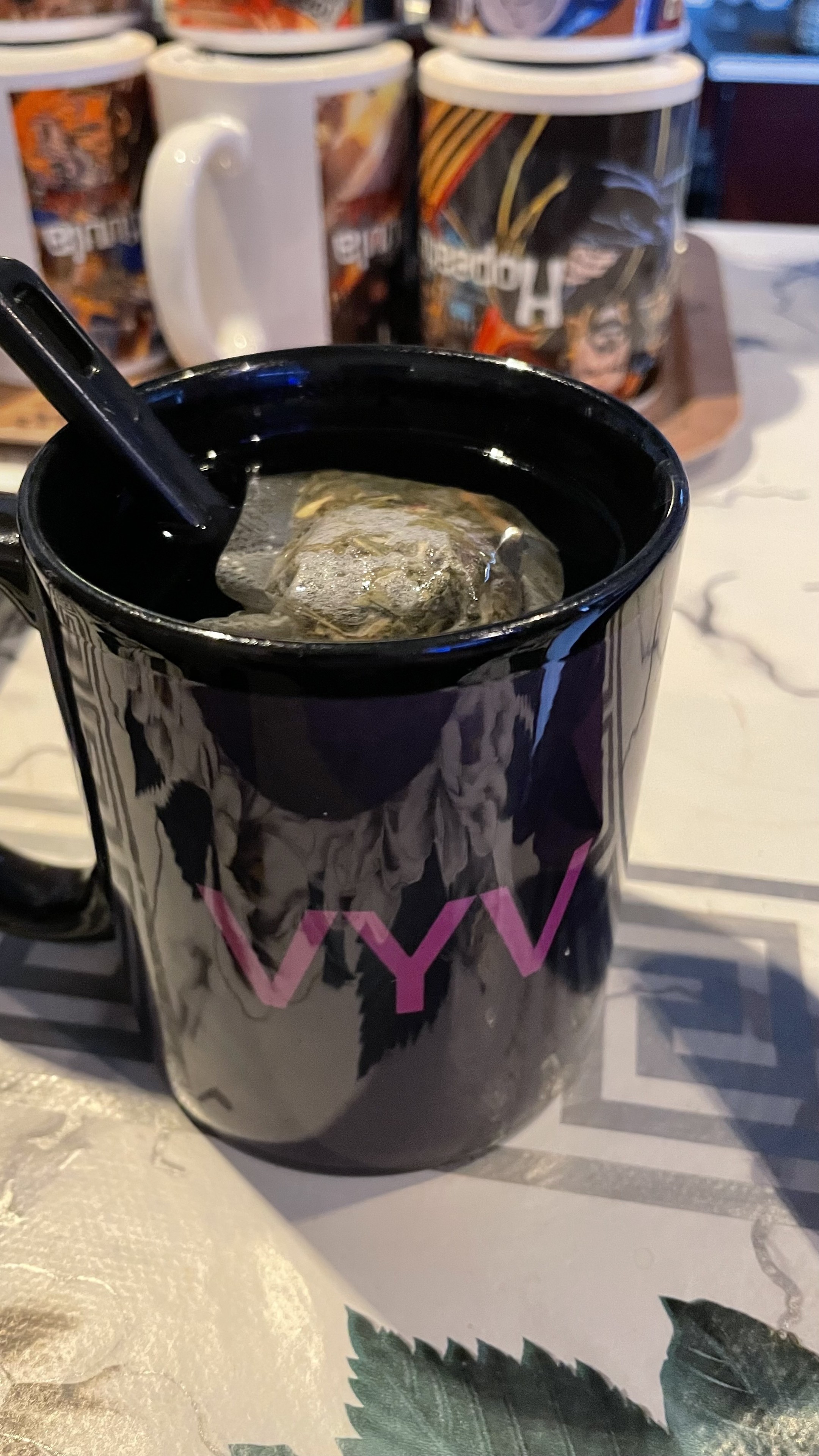 First cup is brewing in my personal mug at the arcade. It is a black mug with my pinball tag VYV in purple.