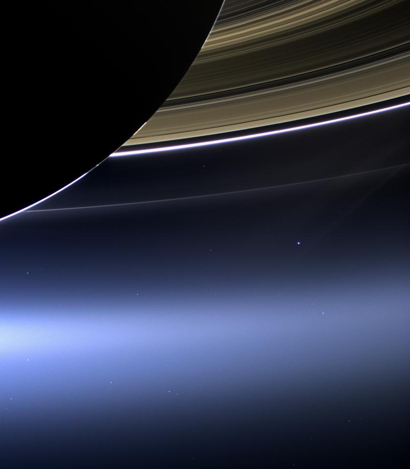 An image from the Cassini space probe. In the foreground is Saturn, its majestic rings curving off towards the right. In the bottom left quadran is a barely visible, pale blue dot. That's us. On it everyone you love, everyone you know, everyone you ever heard of, every human being who ever was, lived out their lives. The aggregate of our joy and suffering, thousands of confident religions, ideologies, and economic doctrines, every hunter and forager, every hero and coward, every creator and destroyer of civilization, every king and peasant, every young couple in love, every mother and father, hopeful child, inventor and explorer, every teacher of morals, every corrupt politician, every "superstar", every "supreme leader", every saint and sinner in the history of our species lived there – on a mote of dust suspended in a sunbeam.