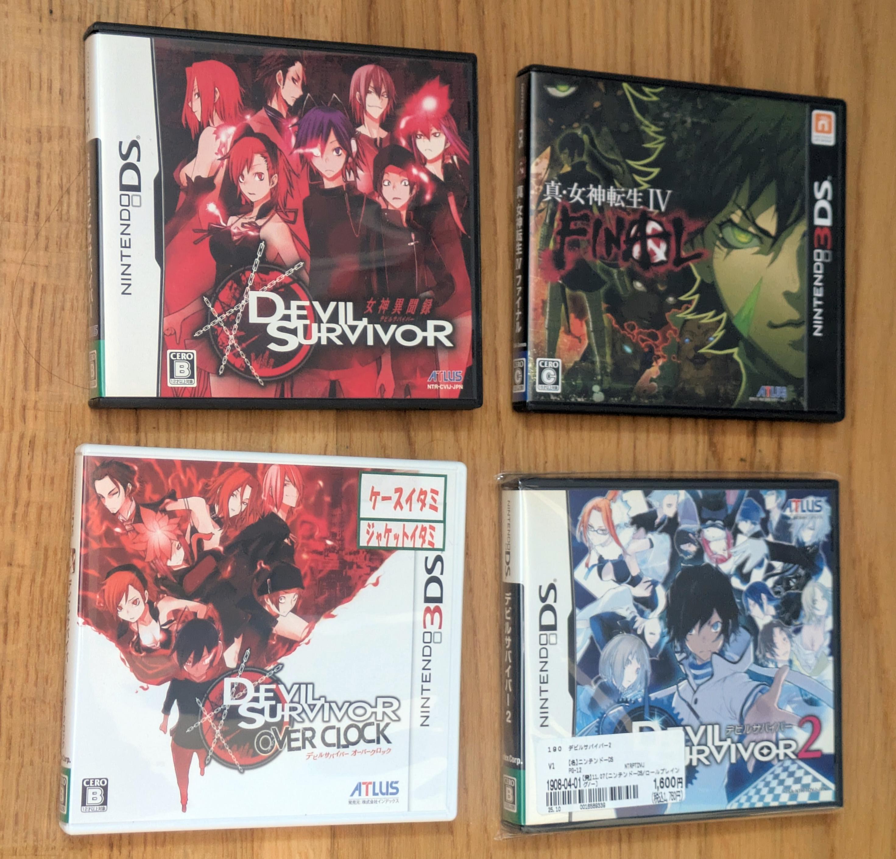 A top-down view of four video game cases resting on a wooden surface.

Top-left: Devil Survivor for the Nintendo DS, featuring a red-themed cover with several anime characters.

Top-right: Shin Megami Tensei IV: Final for the Nintendo 3DS, featuring a dark, green-tinted cover with a close-up of a character's face.

Bottom-left: Devil Survivor Overclocked for the Nintendo 3DS, with a red-themed cover similar to the original Devil Survivor, including a small sticker on the top right indicating case and jacket damage.

Bottom-right: Devil Survivor 2 for the Nintendo DS, featuring a blue-themed cover with a large group of characters and a store price tag sticker at the bottom.